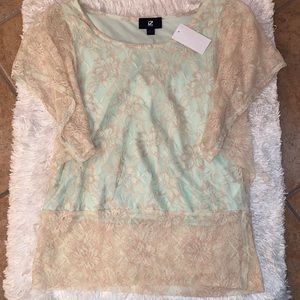 Brand new IZ by Byer cream lace top with mint green tank attached inside.